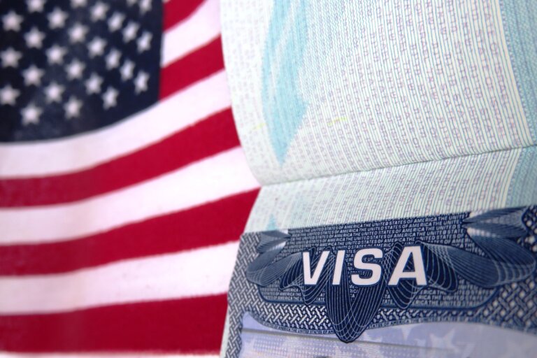 us visa next to the american flag