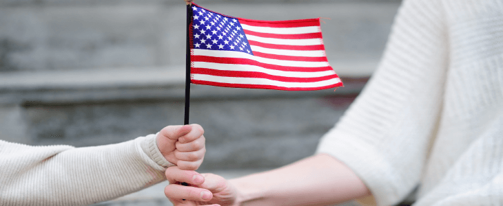 family based immigration in the united states represented by a mom and her child holding the united states flag